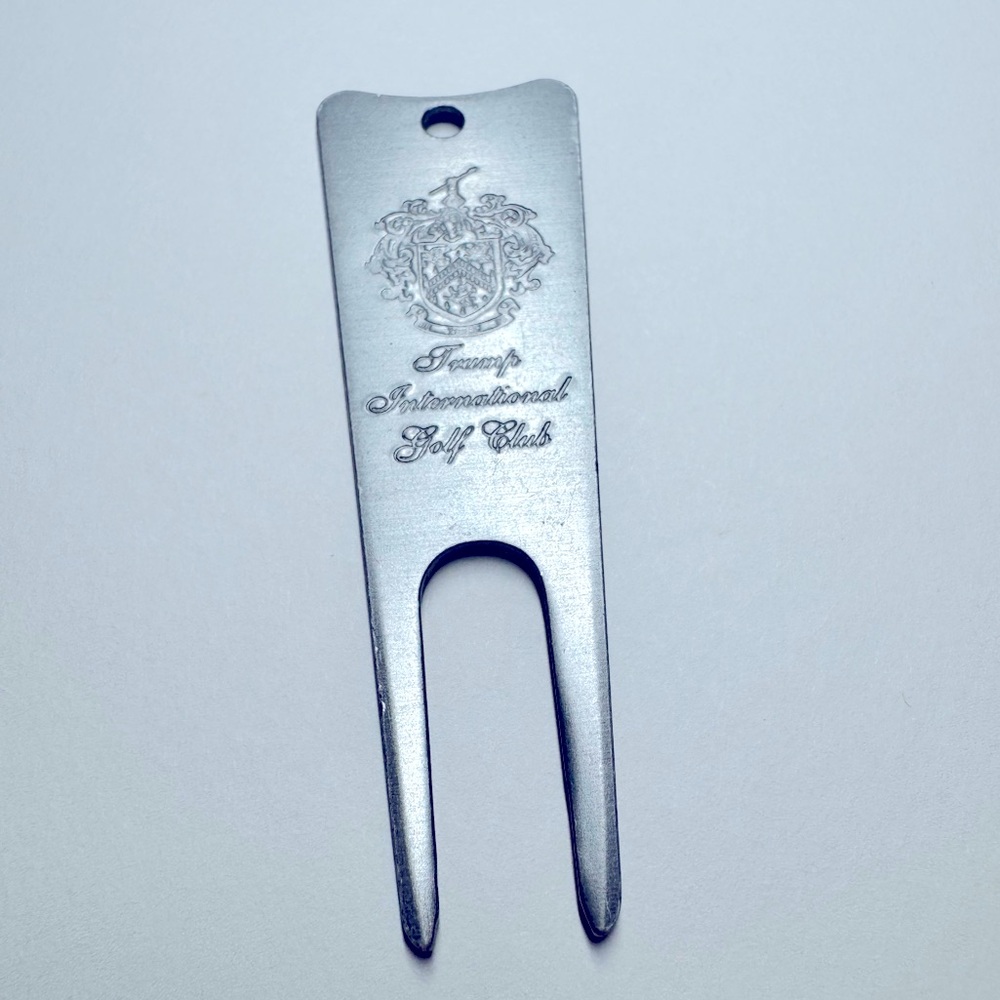 Trump International Golf Club ball divot repair tool